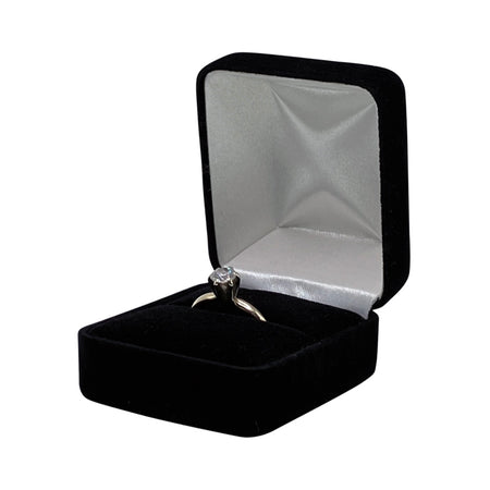 Diamond engagement ring in black velvet ring box