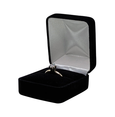 Diamond engagement ring in black velvet ring box